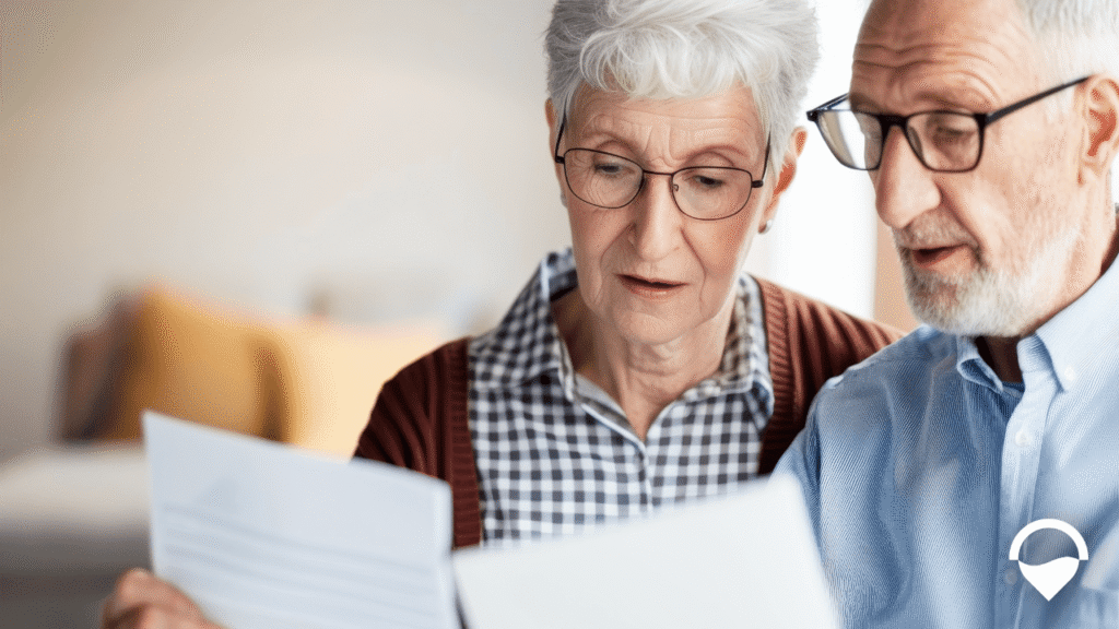 Retired couple reviewing Medicare planning and healthcare documents